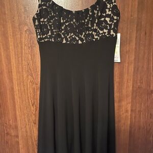 Black dress with pleated skirt